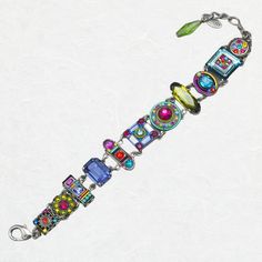 This bright, jewel-encrusted multicolored Firefly La Dolce Vita Bracelet is inset with a combination of European crystals and fire-polished Czech glass beads. The glittering combination of rose, olive, aquamarine, amethyst and amber shades adds sparkle and shine to every outfit. You'll love wearing the Firefly La Dolce Vita Bracelet. Color: Multicolor European crystals and Czech glass Silver-plated, antiqued, hypoallergenic steel chain, setting, and clasp Clean with a soft jewelry polishing clot Multicolor Metal Bracelets With Stones, Adjustable Multicolor Jeweled Bracelets, Metal Bracelets With Multicolor Jeweled Details, Multicolor Rhinestone Bracelet Jewelry, Multicolor Metal Bracelets With Rhinestones, Multicolor Rhinestone Bracelet, Adjustable Multicolor Multi-stone Crystal Bracelet, Multicolor Multi-stone Adjustable Crystal Bracelet, Multicolor Fusion Bracelets With Stones