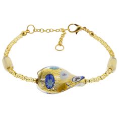 This stunning Murano bracelet features a unique 24K gold leaf twisted bead connected by a strand of 24K gold leaf seed beads. The beauty of gold infused into the glass and exquisite design inspired by Austrian artist Gustav Klimt combine to impress even the most discerning fashionista. The timeless beauty of this Venetian bracelet is a testament to the unparalleled skill of Murano glass masters in creating magic from glass. This versatile piece of jewelry can be worn with your favorite casual or Elegant Yellow Beaded Bracelets With Gold Beads, Elegant Yellow Beaded Bracelet With Gold Beads, Gold Beaded Glass Jewelry, Elegant Glass Beaded Bracelets With Spacer Beads, Gold Glass Jewelry With Gold Beads, Elegant Glass Beaded Bracelets As Gift, Elegant Beaded Glass Bracelets, Elegant Glass Bracelets For Gifts, Elegant Glass Bracelets With Round Beads