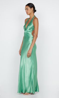 Designed in a flattering silhouette, the BEC + BRIDGE Zariah Halter Dress is cut from a lustrous fabric. The dress features a deep V and a statement halter neckline that ties above an open back. This product is certified Australian made. Green Satin Dress For Gala, Green Dresses With Back Opening For Night Out, Green Dress With Back Opening For Night Out, Green Bias Cut Dress For Night Out, Green Bias Cut Dress For Date Night, Green Formal Halter Dress For Summer, Green Satin Dress For Evening With Bias Cut, Green Backless Dress With Tie Back For Party, Elegant Green Backless Dress With Tie Back