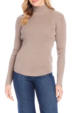 This stretchy top detailed with a cute mock neck makes a perfect layering piece. 25" length (size Medium) Mock neck Long sleeves 70% rayon, 30% nylon Hand wash, dry flat Imported Fall Mock Neck Top With Ribbed Neckline For Layering, Stretch Mock Neck Top With Fine Knit Long Sleeves, Fine Knit Long Sleeve Mock Neck Top For Layering, Stretch Fine Knit Long Sleeve Mock Neck Top, Stretch Fine Knit Mock Neck Top With Long Sleeves, Stretch Turtleneck Top With Ribbed Neckline, Chic High Neck Mock Top For Layering, Chic Mock Neck Top With Ribbed Turtleneck, High Neck Fitted Top For Layering