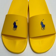 Brand New Without Box. No Box. Msrp $70 Men’s Size 11 Polo Ralph Lauren Yellow With Navy Blue Pony Slides Sandals Slipper No Box Yellow Rubber Sole Slides For Summer, Yellow Slides With Rubber Sole For Summer, Yellow Slides With Round Toe And Rubber Sole, Yellow Cushioned Slides With Round Toe, Yellow Slides With Rubber Sole And Round Toe, Yellow Slide Sandals With Cushioned Footbed, Yellow Summer Slides With Rubber Sole, Yellow Flat Sandals With Rubber Sole, Yellow Open Toe Slides With Cushioned Footbed