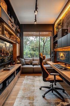 a living room filled with furniture and a flat screen tv sitting on top of a wooden desk