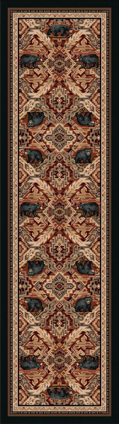 a rug with an ornate design on the bottom and sides, in black frame against a dark background