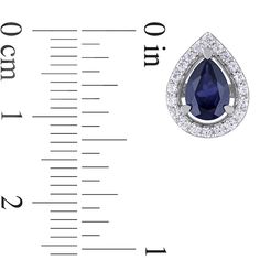 Celebrate her September birthday with this elegant fashion pendant, ring and earrings set. Crafted in sterling silver, each eye-catching piece showcases a pear-shaped lab-created bright blue sapphire wrapped in a halo frame of shimmering lab-created white sapphires. The pendant features an 8.0 x 6.0mm center stone. It suspends along an 18.0-inch cable chain that secures with a spring-ring clasp. The stud earrings are each adorned with 7.0 x 5.0mm blue sapphires and secure comfortably with friction backs. The elegant ring highlights an 8.0 x 6.0mm center stone. Buffed to a brilliant luster, this set arrives beautifully boxed and ready for giving. Teardrop Earrings With Halo Setting For Gift, Sterling Silver Teardrop Earrings With Halo Setting, Teardrop Earrings With Halo Setting As Gift, Teardrop Sapphire Jewelry With Halo Setting, Fine Jewelry Sets With Gemstones For Anniversary, Silver Teardrop Earrings With Halo Setting, Formal Drop Sapphire Jewelry, Formal Sapphire Drop Jewelry, Sapphire Teardrop Jewelry With Halo Setting