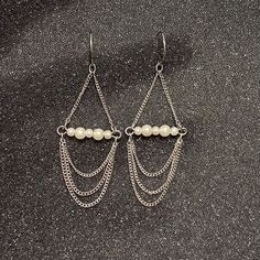 Synthetic Mini White Pearls Fish Hook-White Gold Plated Chain Is Silver Plated About 45 Mm Length White Pearl Jewelry With Silver Chain, White Dangle Chain Jewelry, Silver Dangle Earrings With Delicate Chain, White Pearl Chain Earrings In Sterling Silver, Silver Earrings With Delicate Chain For Formal Occasions, Formal Silver Earrings With Delicate Chain, White Metal Earrings With Pearl Chain, White Pearl Chain Earrings In Metal, Elegant Silver Earrings With Chain Detail