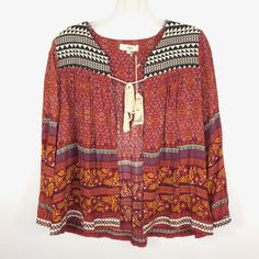 Entro Open Tie Front Boho Red Long Sleeve Blouse Top Sz S New New Size: S Color: Red 100% Rayon Hand Wash Chest (Underarm To Underarm): 21" Waist (Flat Across): 21" Length (Side Of Neck Seam To Hem): 24.5" Sleeve Length (From Shoulder Seam Out): 23" Red Boho Print Tops For Vacation, Summer Red Boho Print Top, Red Boho Print V-neck Top, Red Vacation Top For Fall, Rayon Tops For Fall Festival, Red Bohemian Top With Floral Print, Red Boho Print Top For Festivals, Red Bohemian Tops With Floral Print, Bohemian Red Tops With Floral Print