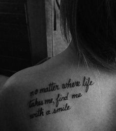 a woman with a tattoo on her back saying no matter where life takes me find me with a smile