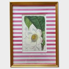 a painting of a white flower with green leaves on pink and white striped wallpaper