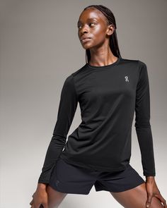 This long-sleeved basic makes running a breeze – especially when there's a breeze. Pair it with anything and everything | On Women's Core Long-T Long-Sleeve Shirt in Black, Size: XL. Cold-weather runs, basics, sustainable Road Running. Performance Running Running In Cold Weather, Half Zip Jacket, Long T, Black Shoes Women, On Running, Basic Long Sleeve, Workout Outfit, Running Tops, Road Running