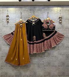 Black Chaniya Choli for Navratri Patola Lehenga 3 pc Readymade garba Lehenga Festival outfit Gamthi Work Garba Night lehenga ready to wear 🌷Lehenga Choli🌷 You get to decide how your Navratri goes. we made that assist decision for you an array of patola Real Hand Work design with gamthi work to make your garba look blend of tradition❣ Top Pattern : Embroidered(Real Hand Work) Lehenga Pattern : Embroidered(Real Hand Work) Lehenga(Stitched) Lehenga Fabric : Rayon Cotton Lehenga Work : Patola Real Hand Work With Gamthi Work Lace Border Pure mal cotton duptta  with foil mirror work  Lehenga Closer : Drawstring With Dori Stitching : Stitched With Canvas and Full Inner Length: 42 Flair : 7 Meter Inner : Micro Cotton Blouse (Stitched) Blouse Fabric : Rayon Cotton (Fully Stitched) Blouse Work : P Designer Anarkali Choli For Navratri, Anarkali Choli For Navratri Designer Wear, Cotton Lehenga With Gota Work For Wedding, Semi-stitched Skirt Set With Pallu For Navratri, Anarkali Style Cotton Choli With Gota Work, Navratri Anarkali Sets With Mirror Work, Cotton Semi-stitched Lehenga With Gota Work, Designer Cotton Lehenga With Gota Work, Cotton Lehenga With Gota Work, Semi-stitched