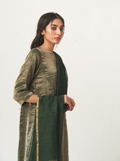 Editor's Note Featuring a zari striped kurta with silk salwar and plain dupatta with zari palla Color: Emerald Green Fabric: Kurta: Tissue; Dupatta: Chanderi; Pant: Cotton Silk Care: Dry Clean Only Tissue Kurta, Emerald Green Fabric, Striped Kurta, Tissue Dupatta, Modern Wedding Ceremony, Chanderi Dupatta, Pakistani Formal Dresses, Fashionable Saree Blouse Designs, Indian Designer Outfits