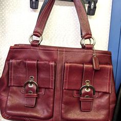 This Vintage Gorgeous Bag Is Big Enough To Fit All Of Your Essentials And Then Some. This Legacy Leather Bag Is The Perfect Go To For The Office. If Cleaned And Moisturized With Leather Protectant Regularly, This Bag Will Last For Years To Come. Bag Is In Excellent Shape. 15"X11"X5.5" With 9" Handle Drop Features Two Inner Pockets For Cell Phones/Sunglasses, And One Zippered Inner Pocket For Important Items Like A Wallet. Additionally This Bag Features Two Exterior Pockets With Hidden Snap Closu Vintage Brown Signature Coated Canvas Bag, Vintage Coach Bag With Double Handle, Coach Burgundy Bag With Zipper Closure, Red Coach Bag With Double Handle, Coach Prarie 1995, Coach Bag, Gorgeous Bags, Cell Phones, Coach Bags