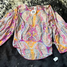 You’ll Feel Like A Gypsy In This Great Blouse By Ivy Jane. Lightweight Breathable Material With Bell Sleeves. Pair It With White Shorts For The Beach Or Match It With Your Ragged Cutoffs And Boots For A Night At A Summer Night Festival. It’s New With Its Tags On. Generous Ivy Jane Sizing. Measurements In Photos Trendy Long Sleeve Tops With Paisley Print, Casual Multicolor Paisley Print Tops, Fall Beach Top With Paisley Print, Paisley Print Top For Beach In Fall, Fall Paisley Print Top For The Beach, Pink Bohemian Blouse With Vibrant Print, Bohemian Pink Blouse With Vibrant Print, Spring Cotton Paisley Print Tops, Spring Cotton Tops With Paisley Print