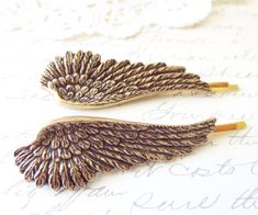 "Beautiful woodland feather angel wing hair pins... Part of my Woodland Collection \"Behind The Shady Tree\" The perfect way to accessorize! You will receive two ox brass feather angel wing hair pins. High quality angel wings are a golden ox brass with amazing detail The bobby pins are gold plated and nickel free Total length is 2 3/4\" Feather wing measures 50x20mm at widest point Verdigris, rose gold, gold and silver available in my shop as shown in photo 4 Please note that this listing is for Angel Wings Hair, Bird Flight, Opal Hair, Moon Accessories, Feather Angel Wings, Floral Hair Pins, Bobby Pin Hairstyles, Virtuous Woman, Feather Hair Clips