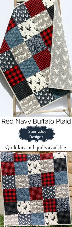 the red navy buffalo plaid quilt is on display in front of a wooden frame and grass