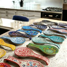 colorful dishes are lined up on the counter