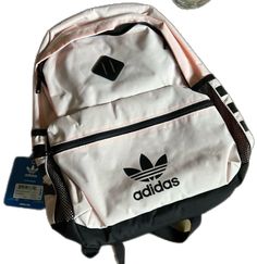 Sporty Pink School Backpack, Sporty Pink Backpack For School, Casual Pink Backpack For Back To School, Sporty Pink Backpack, Sporty Pink Standard Backpack, Pink Sporty Standard Backpack, Casual Pink Bag For Back To School, Adidas Back To School Rectangular Bag, Sporty Pink Everyday Backpack