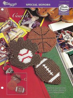 an advertisement for cross stitch keychains featuring footballs and other sports related items