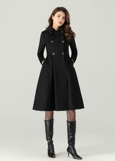 FEATURES 50% wool, 50% wool blend Fully liner with polyester  With pockets Lapel collar  Long sleeve Button closure in front Fitted waist For Winter, Autumn Black wool coat Double breasted wool coat dry clean ★★Mode size Height 170cm (5′ 7″)  Bust 84 cm (33")  Waist 66 cm (26")  She wears size XS. ★★Bespoke Order Service If you Request other color Request the length Your height is not between 155 cm- 175 cm Your weight is not between 47 kg -77 kg I can do it for you, It will need some extra fee depending on on your need. Contact with me for more detail. ★★ Warmly Note: 1 ) : Please confirm your shipping address! If you wish to ship the item to a different address, please send me a message immediately after purchase. We can't change it after shipping, thank you for your understanding. 2 ) : Tailored A-line Outerwear For Winter, Black A-line Outerwear For Work, Single Breasted A-line Outerwear For Work, A-line Outerwear With Button Closure, Chic A-line Wool Coat For Work, Formal Wool A-line Outerwear, Tailored A-line Winter Outerwear, Classic Tailored A-line Outerwear, Winter Wool Coat With Button Cuffs For Office