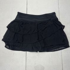 Black Mesh Ruffle Swimsuit Skirt Built-In Shorts Women’s Size Medium Nwt Condition Is New With Tags See Pics Ls 151/24 W3 Kr11 Black High Waist Tennis Skirt For Summer, Black Lined Tennis Skirt For Summer, High Waist Solid Skort With Ruffles, High Waist Ruffled Skort In Solid Color, Solid Mini Skort With Ruffles, Solid Ruffled Mini Skort, Summer Solid Swim Skirt With Ruffles, Black Mini Length Swimwear For Spring, Solid Ruffled Swim Skirt For Summer