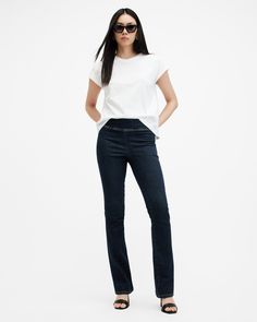 Look good, feel good - the Dani Jeans do it all. Crafted from organic cotton, these skinny bootcut jeans pull on with ease (you won't find a button or zip here). The innovative shaping is made to fit and adapt to the shape of your body - three sizes fits all. The flattering silhouette is ultra-stretchy and sits high on the waist. The perfect pair for going out or dressing down with oversized tees and sweatshirts.  These jeans are designed to a stretchy skinny fit S: W24/25/26, M:W27/28/29, L:W30 Fitted Allsaints Bottoms For Spring, Allsaints Straight Leg Bottoms Relaxed Fit, Allsaints Straight Leg Relaxed Fit Bottoms, Allsaints Relaxed Fit Straight Leg Bottoms, Allsaints Casual Fitted Bottoms, Denim Bootcut Jeans, Oversized Tees, Shorts Co Ord, Look Good Feel Good