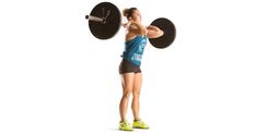 a woman holding a barbell in her right hand and lifting it with both hands