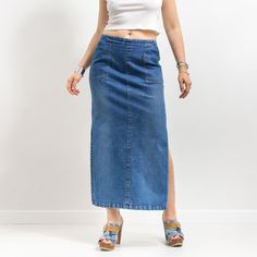 Vintage Y2K denim skirt in blue - slits on both sides of the skirt - back zipper for easy wearing - 2 pockets - made of stretchy denim - material: denim Size from the label: 44 Best fits women: L MEASUREMENTS waist circumference: 31-43 inches (78-87 cm) hips circumference: 39.5 inches (100 cm) length: 37 inches (94 cm) The model is 5'9" (174 cm), measures 35-27-38 (90-69-96 cm) and typically wears clothing in size M CONDITION - 9/10 - The skirt in great vintage condition. Washed, ready to wear. Stretch Denim Pencil Skirt With Pockets, Stretch Dark Wash Skirt With Pockets, Stretch Denim Skirt With Pockets, Blue Stretch Denim Skirt With Pockets, Straight Leg Stretch Skirt With Pockets, Denim Pencil Skirt With Pockets For Summer, High Waist Stretch Denim Skirt In Medium Wash, High Waist Denim Pencil Skirt With Pockets, High Waist Stretch Medium Wash Denim Skirt