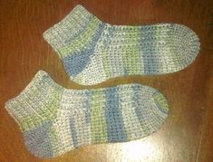 This simple toe-up sock features ridges on top, and linked double crochet soles for comfort. Pattern includes instructions for women's size small, medium, and large, with DETAILED instructions for the short row heel.These socks are suitable for the intermediate beginner with understanding of front and back post stitches. Instructions are included for Linked Double Crochet. Pattern also includes information on adjusting to fit your own foot size. I've been told that I crochet fairly ti... Linked Double Crochet, Baby Socks Design, Socks Crochet Pattern, Short Row Heel, Easy Crochet Socks, Socks Crochet, Crochet Baby Socks, Crochet Socks Pattern, Glove Pattern