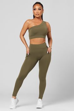 The silhouette that everyone loves, just elevated. With a wide band for extra support and a sleek design for a more classy look, our new Classic One Shoulder is the perfect edition to your favorite legging. The details: Supportive, covered elastic band Removable Pads Quick-dry fabric 75% nylon / 25% spandex Gym Fits, Hidden Pocket, New Classic, How To Look Classy, Wide Bands, Pet Hair, Printed Leggings, Elastic Band, Sleek Design