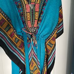 Nwt Summer Kaftan Or Beach Cover Up Free Size Leave Open And Flowy Or Cinch (Working Drawstring) For A Different Look Ptp : 25 Gold Accents Lightweight Blue Boho Print Summer Kaftan, Blue Boho Print Kaftan For Beach Season, Blue Summer Kaftan With Boho Print, Blue Casual Kaftan For Festivals, Casual Blue Kaftan For Festival, Blue Boho Print Kaftan For Vacation, Blue Vibrant Print Kaftan For Beach, Multicolor Sleeveless Kaftan For Vacation, Blue Vibrant Print Kaftan For The Beach