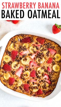 strawberry banana baked oatmeal in a white casserole dish with strawberries and bananas