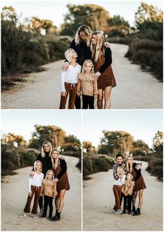 a family posing for pictures in the middle of a dirt road