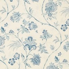 a blue and white wallpaper with floral designs on the back ground, in an iphone photo