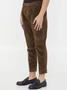 Straight-leg trousers in brown corduroy. It features zip, button and hook-and-eye closure, two side welt pockets, two rear buttoned flap pockets and belt loops. Regular fit. The model is 184cm tall and wears size IT 48.  Size nationality: IT  Product number: 39657252  Product code: CORSZAZ40FWDTU87N175  Composition: 75% cotton, 24% lyocell, 1% elastane Brown Tapered Leg Chinos With Belt Loops, Brown Straight Leg Corduroy Bottoms, Brown Corduroy Straight Leg Bottoms, Brown Straight Chinos With Belt Loops, Corduroy Workwear Bottoms With Five Pockets, Corduroy Tapered Leg Pants With Welt Pockets, Corduroy Pants With Welt Pockets And Tapered Leg, Brown Corduroy Pants For Work, Brown Corduroy Bottoms With Belt Loops