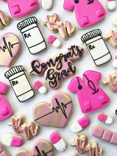 decorated cookies with the words congrats grad and doctor's stethoscope