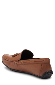 A refined, sophisticated leather loafer with a whipstitched detail is a versatile staple to go with any outfit. Moc toe Slip-on Cushioned insole Leather upper, manmade sole Imported Business Brown Boat Shoes With Leather Footbed, Brown Leather Sole Boat Shoes For Formal Occasions, Driving Loafers With Leather Sole And Plain Toe, Formal Brown Boat Shoes With Leather Sole, Leather Tassel Loafers With Branded Insole, Brown Stitched Sole Boat Shoes For Formal Wear, Brown Slip-on Boat Shoes For Formal Occasions, Brown Formal Boat Shoes With Stitched Sole, Formal Brown Boat Shoes With Leather Lining