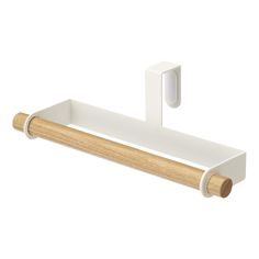 a white towel rack with two wooden handles