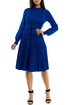 A tonal sash accentuates your figure in a long-sleeve sweater dress with a flattering fit-and-flare profile. 41 1/2" length Mock neck
 Long sleeves 78% rayon, 22% polyester Machine wash, tumble dry Imported Model stats: 5'10" height, 32" bust, 25" waist, 36" hip. Chic Pleated Long Sleeve Dress For Winter, Stretch Long Sleeve Dress For Fall, Fall A-line Ribbed Dress, Solid Color Long Sleeve Dress For Fall, Chic Blue Long Sleeve Winter Dress, Winter Pleated Long Sleeve Dress, Fall Ribbed A-line Dress, Winter Workwear Long Sleeve Stretch Dress, Stretch Midi-length Long Sleeve Dress For Fall