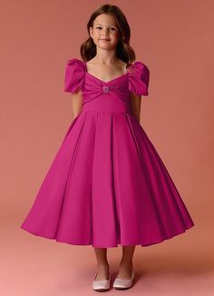 This tea length dress features puff sleeves, a detachable bow back, a hand sewn rhinestone pendant, a box pleated skirt, and pockets. Fitted Bodice Dress With Bow And Sweetheart Neckline, Fitted Bodice Dress With Sweetheart Neckline And Bow, Solid Dress With Pleated Bodice And Sweetheart Neckline, Formal Dress With Satin Bow And Sweetheart Neckline, Short Sleeve Princess Dress With Bow For Party, Elegant Puff Sleeve Princess Dress For Wedding, Puff Sleeve Dress With Bow For Party, Elegant Fitted Princess Dress With Puff Sleeves, Elegant Dresses With Pleated Bodice For Dress-up