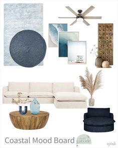 a living room with blue and white decor on the walls, couches, rugs and other items