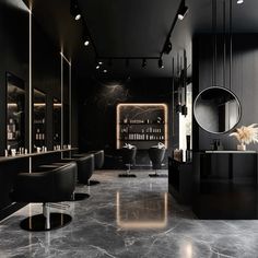 the interior of a hair salon with black chairs and marble flooring, mirrors on the wall