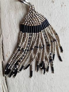 Long flowy beaded fringe earrings in silver and black with a stainless steel hinged earhook for secure closure and for hypoallergenic properties. Beaded Fringe Earrings, Native American Style, Bead Bangles, Matte Metallic, Native American Fashion, Beaded Fringe, Black Earrings, Fringe Earrings, Focal Bead