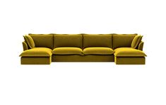 a yellow couch with two pillows on it and one arm extended to the side, in front of a white background