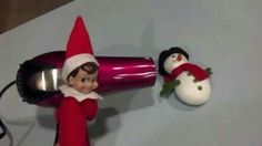 an elf with a blow dryer and two snowmen in the background that says, well, he said'blow me '