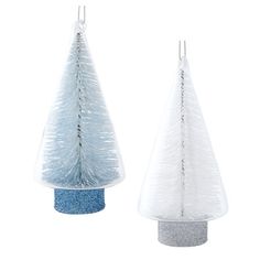 two white and blue christmas trees on top of each other