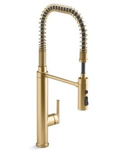 the kitchen sink faucet is shown in gold