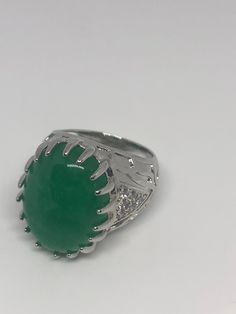 Large green nephrite jade Ornate German Silver Vintage ring, does not tarnish, NOT sterling Sizes 7, 8 and 9 All rings are shipped in a nice gift box. Check out our over a THOUSAND great reviews Engraving is $4 per letter and is not always perfect depending on the piece. It can take a few days if the jeweler is busy. This is payable to Paypal Judithsltd@gmail.com Green Ring With Polished Finish For Formal Occasions, Formal Green Ring With Polished Finish, Green Signet Ring With Polished Finish For May Birthstone, Oval Green Emerald Signet Ring, Oval Emerald Signet Ring In Green, Green Ring With Large Stone, Green Signet Ring For May Birthstone, Green Oval Gemstone Rings, Oval Green Rings With Polished Finish