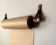 a roll of toilet paper hanging on the wall