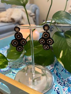 These Black & Gold Beaded Statement Dangle Earrings are the perfect style touch for any occasion! From casual Friday vibes to tailgates, they're the perfect pop of pretty. Wear for your Black and Gold team, or wear with a black cocktail dress to complete your head-to-toe dazzling look. 2" in Length, Lead & Nickel Compliant Friday Vibes, Black Earrings Dangle, Black Cocktail, Casual Friday, Perfect Style, Black Cocktail Dress, Gold Beads, Black And Gold, Dangle Earrings