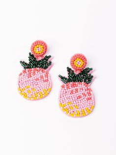 We are obsessed with these fun and summery earrings Pineapple Earrings! These beaded earrings are so cute and easy to bring that little bit of summer to any outfit! Seed bead pineapple dangle earrings 2" Brass plated Hypoallergenic Surgical steel posts Nickel and lead-free Trendy Pink Fruit Design Earrings, Pineapple Clay Earrings, Pineapple Beaded Earrings, Summer Pink Fruit Design Earrings, Vibrant Pink Beach Earrings, Pineapple Earrings, Seed Bead, Beaded Earrings, So Cute